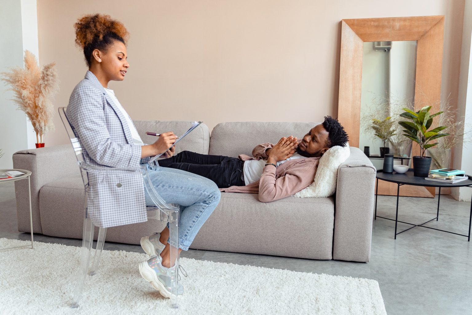 A person speaking with a compassionate mental health provider during a therapy session