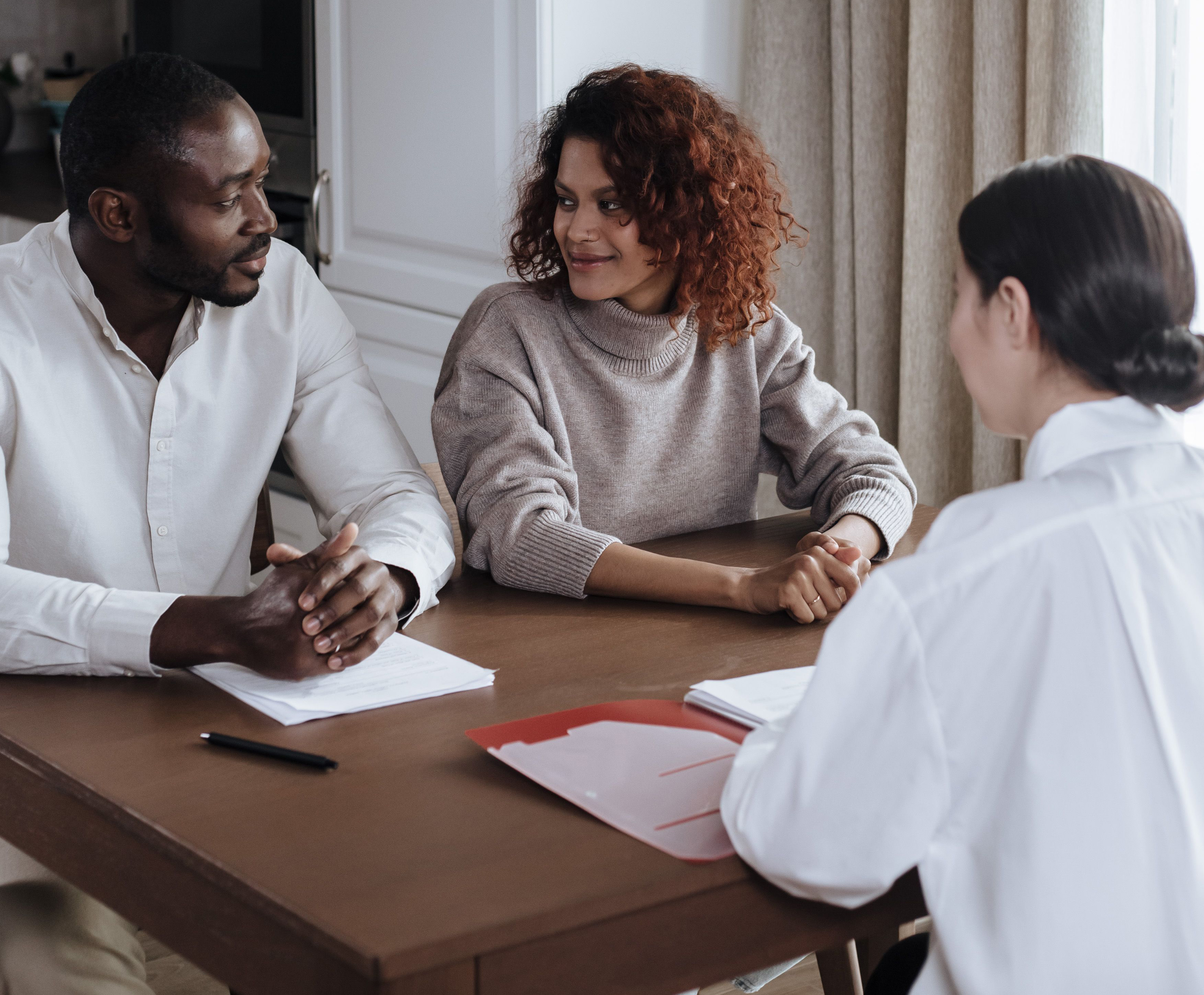 A couple in a counseling session with a mental health provider